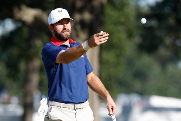 MEDINAH, IL - SEPTEMBER 26: Cameron Young of the United States tosses a ball to his caddie on the No. 7 green during the Saturday four ball session of the Presidents Cup, September 26, 2026, at Medinah Country Club in Medinah, Illinois. (Photo by Matthew Maxey Icon Sportswire) GOLF: SEP 26 Presidents Cup EDITORIAL USE ONLY Icon260926036