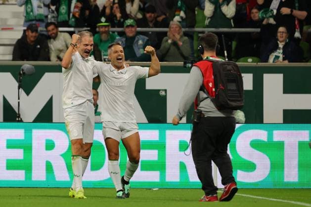 September 26, 2026, Soccer, FBL Men s League, Friendly Match, 100 Years of the Weserstadion, Werder Legends vs. Real Madrid Legends 2026, Werder Legends vs. Real Madrid Leyendas: Goal celebration, cheers, goal scorer(s), Angelos Charisteas; Werder Legends celebrate the 3–2 goal together with Diego; Werder Legends photo by nordphoto GmbH, Tauchnitz, Bremen, Weserstadion, Bremen, Germany Copyright: xnordphotoxGmbHx xTauchnitzx