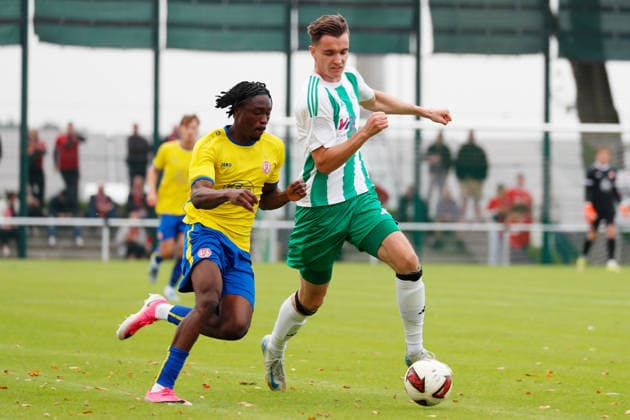 Straelen, Germany, September 26, 2026, Lower Rhine Cup 2026–2027, Round 2: Sportfreunde Broekhuysen vs. Rot Weiss Essen. Pictured, from left, in a tackle: Dickson Abiama (RWE) and Nils Lachmann (Broekhuysen). Stadium on Römerstraße, North Rhine-Westphalia Copyright: xFotostandx xVanxderxVeldenx