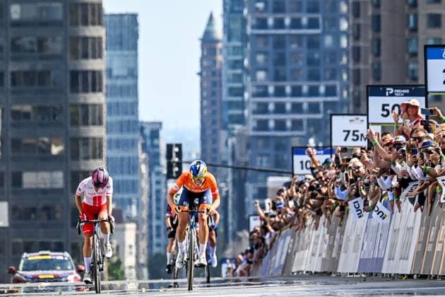 Dutch Demi Vollering celebrates as she crosses the finish line to win the elite women Road Race race (180,4 km) at the cycling World Championship, WM, Weltmeisterschaft in Montreal, Canada, Saturday 26 September 2026. The UCI road world championships are taking place from 20 to 27 September, in Montreal, Canada. JASPERxJACOBS  x187909237x