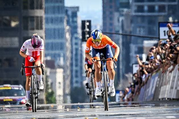 Dutch Demi Vollering celebrates as she crosses the finish line to win the elite women Road Race race (180,4 km) at the cycling World Championship, WM, Weltmeisterschaft in Montreal, Canada, Saturday 26 September 2026. The UCI road world championships are taking place from 20 to 27 September, in Montreal, Canada. JASPERxJACOBS  x187909240x