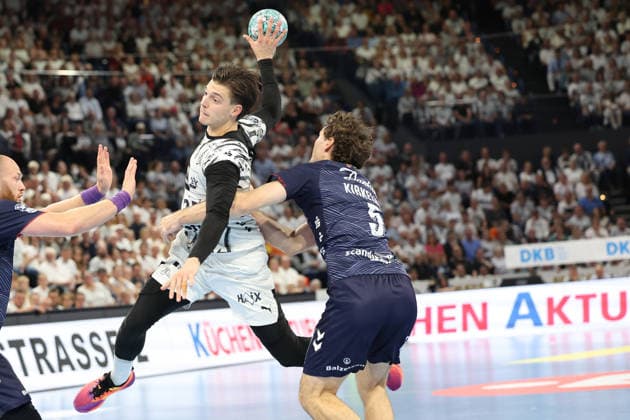 September 26, 2026, xBHAx, Handball, Opel HBL, 2026–2027 Season, 1st HBL, THW Kiel vs. SG Flensburg-Handewitt, Merkur Ostseehalle: Domen Makuc (THW Kiel, No. 35) on the attack against Niclas Kirkelökke (SG Flensburg-Handewitt, No. 5), Schleswig-Holstein, Germany