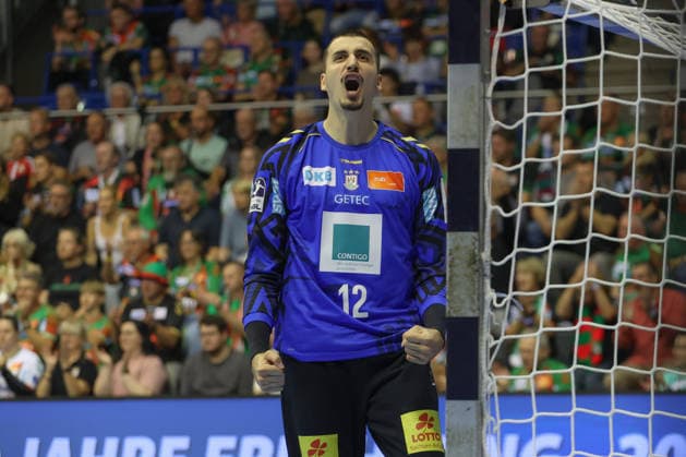 September 26, 2026, xtgx, Opel HBL Handball, SC Magdeburg vs. SG BBM Bietigheim emspor, from left: Matej Mandic (Magdeburg), 12 celebrating a saved shot, blocked, saved, Magdeburg goalkeeper