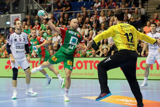September 26, 2026, xgox, Handball Opel HBL SC Magdeburg vs. SG BBM Bietigheim emspor, from left: Oscar Bergendahl (Magdeburg), 54, takes a shot, goal scorer, scores a goal, Magdeburg