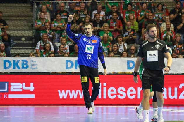 September 26, 2026, xgox, Handball: Opel HBL SC Magdeburg vs. SG BBM Bietigheim emspor; from left: Matej Mandic (Magdeburg), 12 celebrating a saved shot; blocked, saved; Magdeburg goalkeeper