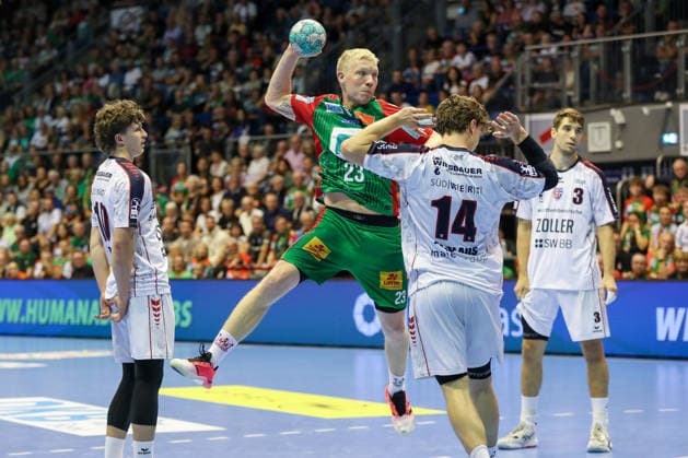 September 26, 2026, xgox, Handball Opel HBL SC Magdeburg vs. SG BBM Bietigheim emspor, from left: Magnus Saugstrup (Magdeburg), 23 shots on goal, goal scorer, scores a goal, Magdeburg