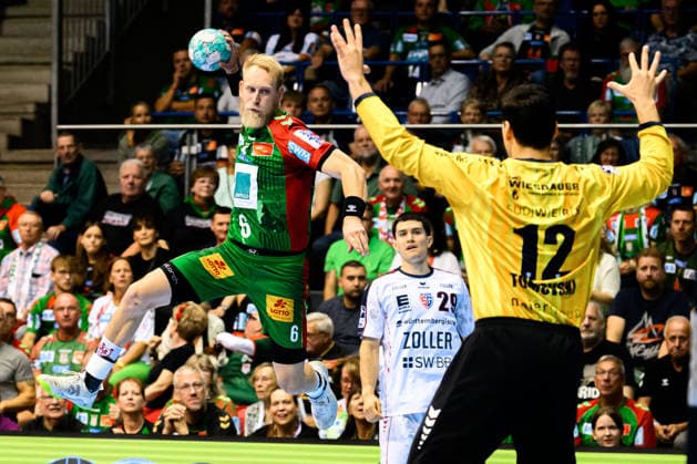 Magdeburg HBL 26 27 SC Magdeburg SG BBM Bietigheim (from left) Matthias Musche (SC Magdeburg), goalkeeper Martin Tomovski (Bietigheim), Magdeburg, Getec Arena, Germany