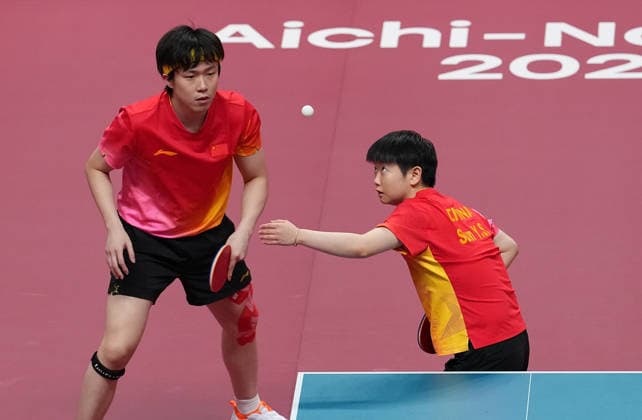 (260926) -- TOYOTA, Sept. 26, 2026 -- Wang Chuqin Sun Yingsha (R) of China compete during the mixed doubles final match of Table tennis, Tischtennis between Wang Chuqin Sun Yingsha of China and Lin Shidong Kuai Man of China at the 20th Asian Games Aichi-Nagoya 2026 in Toyota of Aichi Prefecture, Japan, Sept. 26, 2026. ) (SP)JAPAN-TOYOTA-ASIAN GAMES-TABLE TENNIS-MIXED DOUBLES-FINAL CheongxKamxKa 