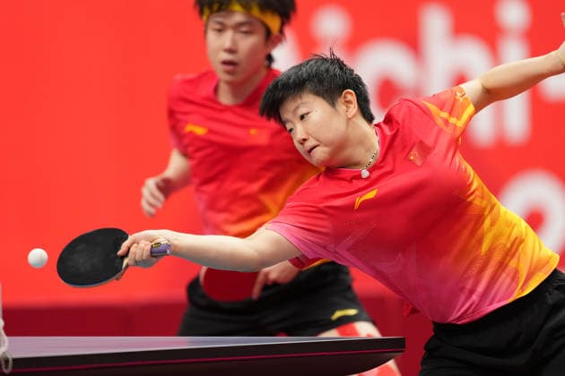 (260926) -- TOYOTA, Sept. 26, 2026 -- Wang Chuqin Sun Yingsha (R) of China compete during the mixed doubles final match of Table tennis, Tischtennis between Wang Chuqin Sun Yingsha of China and Lin Shidong Kuai Man of China at the 20th Asian Games Aichi-Nagoya 2026 in Toyota of Aichi Prefecture, Japan, Sept. 26, 2026. ) (SP)JAPAN-TOYOTA-ASIAN GAMES-TABLE TENNIS-MIXED DOUBLES-FINAL WangxFei 
