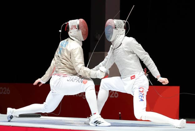 (260926) -- TOKONAME, Sept. 26, 2026 -- Do Gyeongdong (R) of team South Korea vies with Kokubo Mao of team Japan during the men s sabre team final of Fencing at the 20th Asian Games Aichi-Nagoya 2026 in Tokoname, Aichi Prefecture, Japan, Sept. 26, 2026. ) (SP)JAPAN-TOKONAME-ASIAN GAMES-FENCING-MEN S SABRE TEAM-FINAL YaoxQilin 