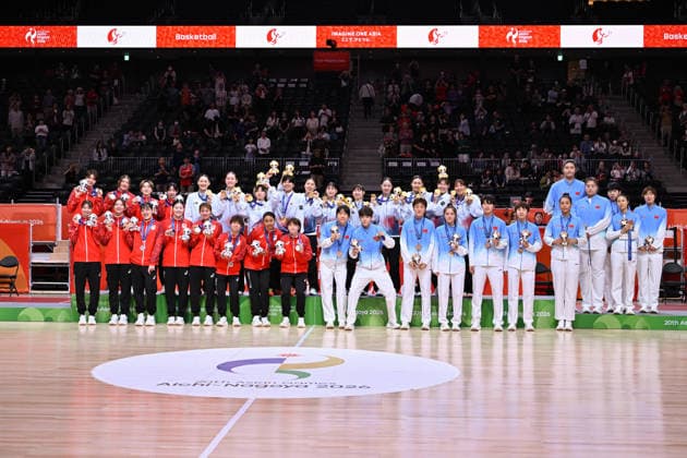 (260926) -- NAGOYA, Sept. 26, 2026 -- Gold medalists team South Korea (C), silver medalists team Japan (L) and bronze medalists team China pose during the awarding ceremony after the women s final match of basketball between Japan and South Korea at the 20th Asian Games Aichi-Nagoya 2026 in Nagoya, Japan, Sept. 26, 2026. ) (SP)JAPAN-NAGOYA-ASIAN GAMES-BASKETBALL-WOMEN S FINAL TaoxXiyi 