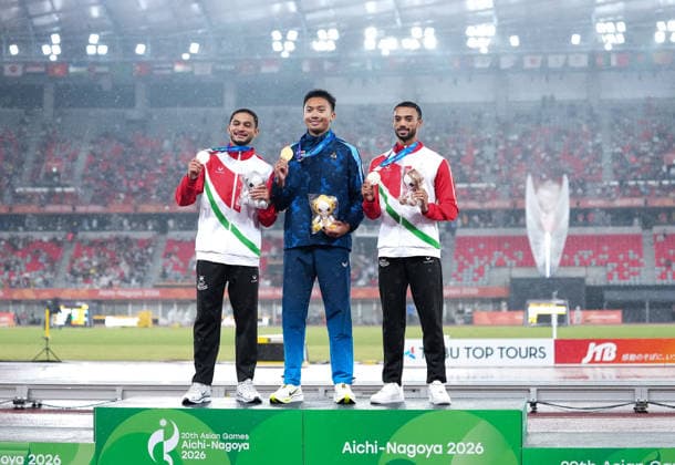 (260926) -- NAGOYA, Sept. 26, 2026 -- Gold medalist Puripol Boonson (C) of Thailand, silver medalist Ali Al Balushi of Oman, and bronze medalist Malham Al Balushi of Oman pose during the awarding ceremony for the men s 100m of Athletics at the 20th Asian Games Aichi-Nagoya 2026 in Nagoya, Japan, Sept. 26, 2026. ) (SP)JAPAN-NAGOYA-ASIAN GAMES-ATHLETICS-MEN S 100M LuoxYuan 