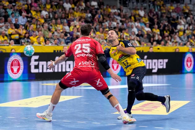 From left: Olle Forsell Schefvert MTM, 25, Dani Baijens RNL, 77, tackle, game scene, duel, tackle, tackling, dynamic, action, shot, during a shot on goal, September 26, 2026, Mannheim, Germany, handball, Bundesliga, Rhein-Neckar Löwen vs. MT Melsungen xozx