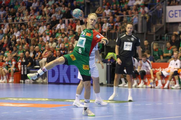 September 26, 2026, xtgx, Opel HBL Handball, SC Magdeburg vs. SG BBM Bietigheim emspor, from left: Matthias Musche (Magdeburg), 6 shots on goal, goal scorer, scores a goal, Magdeburg