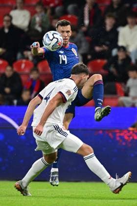 Robin Hranac (CZE), bellow, and Ivan Perisic (CRO) in action during the UEFA Nations League, A3 group 1st round match: Czechia vs Croatia, in Prague, Czech Republic, on September 26, 2026. (CTKxPhoto VitxSimanek) CTKPhotoP2026092606362  CTKPhotoP2026092606362