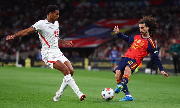 London, England, 26th September 2026. Jarell Quansah of England and Marc Cucurella of Spain challenge for the ball during the England vs Spain UEFA Nations League match at Wembley Stadium, London. Picture credit should read: Paul Terry Sportimage EDITORIAL USE ONLY. No use with unauthorised audio, video, data, fixture lists, club league logos or live services. Online in-match use limited to 120 images, no video emulation. No use in betting, games or single club league player publications. SPI_053_PT_England_Spain SPI-5020-0052