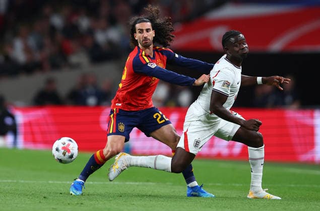 London, England, 26th September 2026. Marc Cucurella of Spain and Bukayo Saka of England challenge for the ball during the England vs Spain UEFA Nations League match at Wembley Stadium, London. Picture credit should read: Paul Terry Sportimage EDITORIAL USE ONLY. No use with unauthorised audio, video, data, fixture lists, club league logos or live services. Online in-match use limited to 120 images, no video emulation. No use in betting, games or single club league player publications. SPI_055_PT_England_Spain SPI-5020-0054