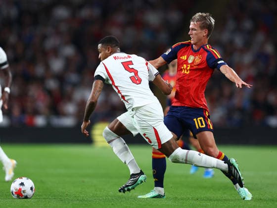 London, England, 26th September 2026. Ezri Konsa of England and Dani Olmo of Spain challenge for the ball during the England vs Spain UEFA Nations League match at Wembley Stadium, London. Picture credit should read: Paul Terry Sportimage EDITORIAL USE ONLY. No use with unauthorised audio, video, data, fixture lists, club league logos or live services. Online in-match use limited to 120 images, no video emulation. No use in betting, games or single club league player publications. SPI_063_PT_England_Spain SPI-5020-0062