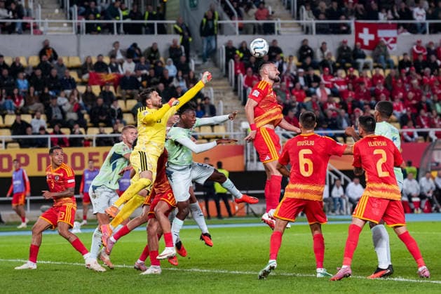 Soccer: UEFA Nations League 2026–2027, September 26, 2026, North Macedonia vs. Switzerland, National Arena Todor Proeski, Stole Dimitrievski 23, North Macedonia; Johan Manzambi 9, Switzerland; and Gjoko Zajkov 5, North Macedonia, battling for the ball Copyright: xValentinxDomgjonix