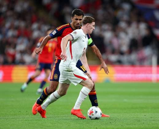 Elliot Anderson of England is shadowed by Rodri of Spain England v Spain, UEFA Nations League 2026 27 Group A3, Football, Wembley Stadium, London, UK, 26 09 2026 - 26 Sep 2026London Wembley Stadium England United Kingdom  Copyright: xHanc WiredxPhotos Shutterstockx 17171296ci
