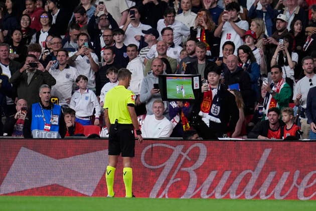September 26, 2026, London, London, England: Davide Massa, referee of the match, checks the VAR during the UEFA Nations League 2026 27 League Phase MD1 Group A3 match between England and Spain at Wembley Stadium on September 26, 2026, in London, England. England V Spain - UEFA Nations League 2026 27 League Phase MD1 Group A3  - ZUMAa181 20260926_zaa_a181_209 Copyright: xDennisxAgyemanx