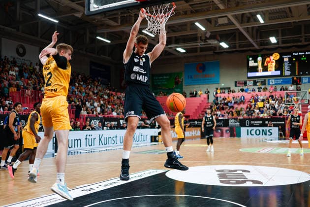 Kristian Henning Sjolund, Tigers Tübingen, 12, and Lorenz Brenneke, MLP Academics Heidelberg, 19, GER, Tigers Tübingen vs. MLP Academics Heidelberg, Basketball, ProA, Matchday 1, 2026–2027 season, September 26, 2026, GER, Tigers Tübingen vs. MLP Academics Heidelberg, Basketball, ProA, Matchday 1, 2026–2027 season, September 26, 2026, Tigers Tübingen Copyright: xEibner-Pressefoto KirstenxJaegerx