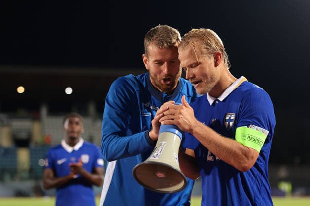 San Marino v Finland - UEFA Nations League - Season 2026-2027 Serravalle, Italy, 26th September 2026. Joel Pohjanpalo and Lukas Hradecky of Finland sing in to a megaphone following the final whistle of the San Marino vs Finland UEFA Nations League match at San Marino Stadium, Serravalle. Picture credit should read: Jonathan Moscrop Serravalle San Marino Stadium San Marino