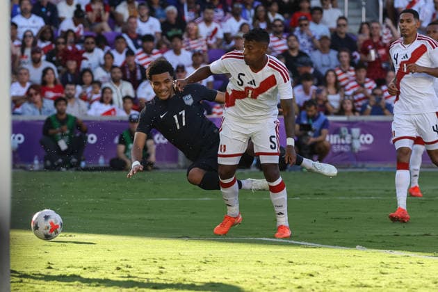September 26, 2026, Orlando, Florida, USA: United States midfielder MALIK TILLMAN (17) and Peru defender MIGUEL ARAUJO (5) battle for the ball during the second half of a match between Peru and the United States. The United States hosted Peru in an International Friendly, Länderspiel, Nationalmannschaft at Inter&Co Stadium in Orlando, FL. Orlando USA - ZUMAm299 20260926_znp_m299_009 Copyright: xTaylorxMcFeex