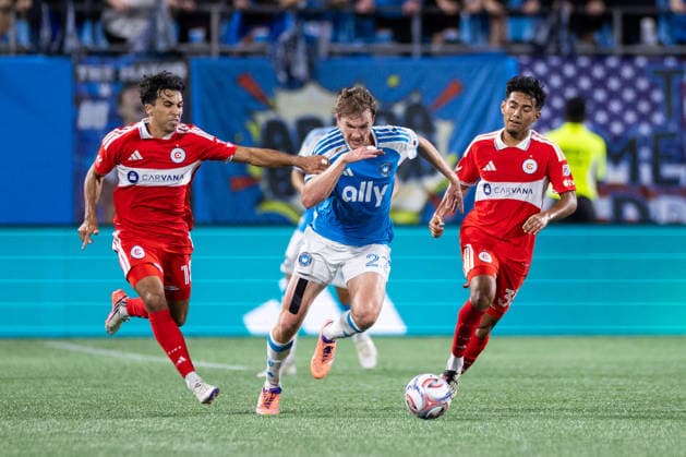 September 26, 2026: Charlotte FC defense Henry Kessler (22) pushes upfield against Chicago Fire FC midfielder Johan Gomez (18) in the first half of the MLS, Fussball Herren, USA match up at Bank of America Stadium in Charlotte, NC. Mandatory Credit: -Cal Media Charlotte United States - ZUMAc04_ 20260926_zma_c04_391 Copyright: xScottxKinserx