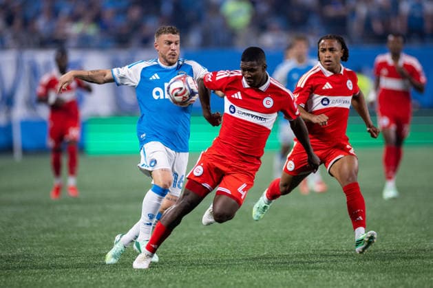 September 26, 2026: Chicago Fire FC defender Mbekezeli Mbokazi (4) elbow s the ball away against Charlotte FC midfield Pep Biel (16) during the first half of the MLS, Fussball Herren, USA match up at Bank of America Stadium in Charlotte, NC. Mandatory Credit: -Cal Media MLS 2026: Chicago Fire At Charlotte FC Sep 26  - ZUMAc04_ 20260926_zma_c04_399 Copyright: xScottxKinserx