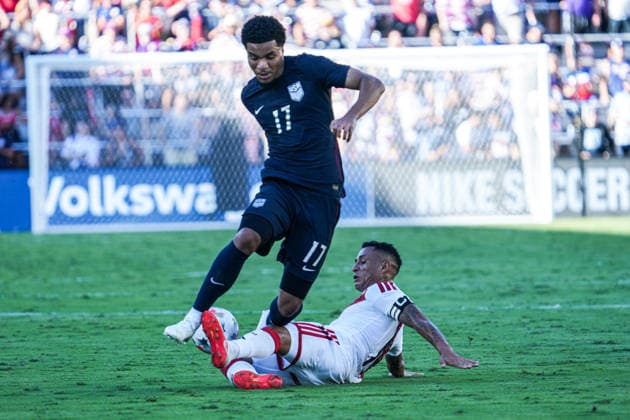 Peru v USA in a friendly Florida Series Match, Orlando, Florida Orlando, Florida, USA, September 26, 2026, USA player Malik Tillman 17 avoid the slide tackle from Yoshimar Yotun 19 at Inter.Co Stadium. Copyright: xMartyxJean-Louisx