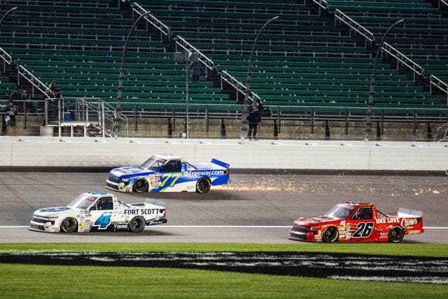 KANSAS CITY, KS - SEPTEMBER 26: Sparks fly from the truck of Nicholas Sanchez ( 77 Spire Motorsports Chevrolet) as he races on the frontstretch during the NASCAR, Motorsport, USA CRAFTSMAN Truck Series Playoffs Race to Stop Suicide 200 on Saturday, September 26, 2026, at Kansas Speedway in Kansas City, KS. (Photo by Kyle Ocker Icon Sportswire) AUTO: SEP 26 NASCAR CRAFTSMAN Truck Series Playoffs Race to Stop Suicide 200 EDITORIAL USE ONLY Icon260926023