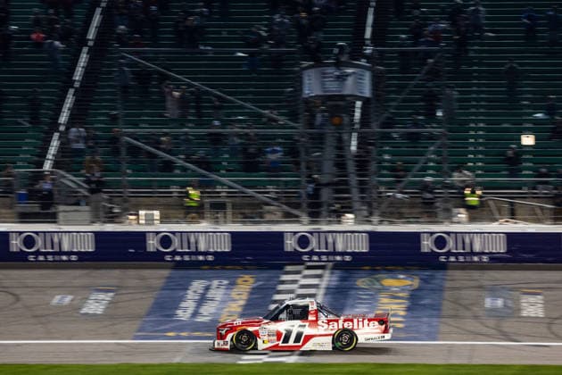KANSAS CITY, KS - SEPTEMBER 26: Kaden Honeycutt ( 11 TRICON Garage Toyota) takes the checkered flag during the NASCAR, Motorsport, USA CRAFTSMAN Truck Series Playoffs Race to Stop Suicide 200 on Saturday, September 26, 2026, at Kansas Speedway in Kansas City, KS. (Photo by Kyle Ocker Icon Sportswire) AUTO: SEP 26 NASCAR CRAFTSMAN Truck Series Playoffs Race to Stop Suicide 200 EDITORIAL USE ONLY Icon260926025