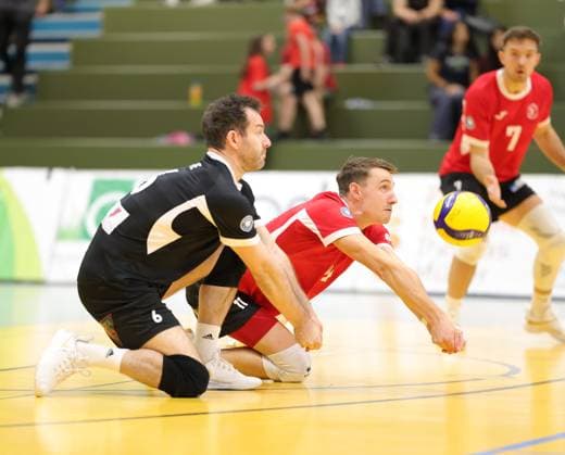 Germany, Kriftel, September 26, 2026; Volleyball; Hesse; 2nd Bundesliga Men s South 2026–2027; TuS Kriftel (red) vs. Keiler Volleys Stuttgart (black); Final score: 3–2; from left: Felix Blume, TuS Kriftel, No. 6, Cedric Braetsch, TuS Kriftel No. 11; Sport: TuS Kriftel, Keiler Volleys Stuttgart