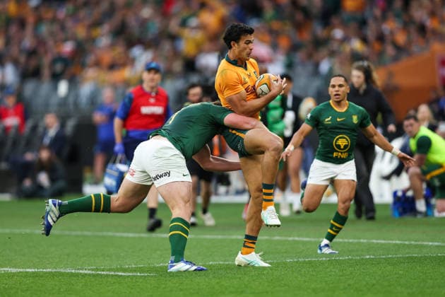RUGBY UNION AUSTRALIA SOUTH AFRICA, Joseph-Aukuso Suaalii of the Wallabies is tackled by Jan-Hendrik Wessels of the Springboks during the international rugby test match between the Australian Wallabies and South Africa at Optus Stadium in Perth, Sunday, September 27, 2026. ( NO ARCHIVING, EDITORIAL USE ONLY PERTH Western Australia Australia  Copyright: xTravisxHaytox 20260927196376403387