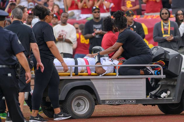 September 26, 2026, Los Angeles, California, USA: 5 Dante Moore, QB of the Oregon Ducks, is carted off the field by the medical team after being tackled by 8 Desman Stephens II, LB, during a Big Ten football game against the USC Trojans on Saturday, September 26, 2026, at the Los Angeles Memorial Coliseum in Los Angeles, California. Stephens was ejected for targeting. Moore was taken to L.A. General for evaluation. Trojans lose to Ducks, 41-27. MARK HAMMOND BNS PI Trojans Lose To Ducks, 41-27  - ZUMAp124 20260926_zaa_p124_096 Copyright: xJavierxRojasx