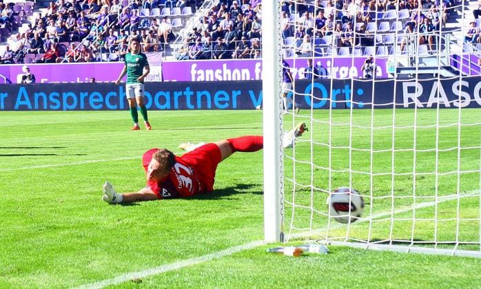 Goalkeeper Marcel Bergmann of Leipzig reaches in vain for the shot by Tim Maciejewski of Aue, not shown in the photo: 1–0, 2026–27 Northeast Regional League soccer match between FC Erzgebirge Aue and Chemie Leipzig on September 27, 2026, Erzgebirge Aue vs. Chemie Leipzig