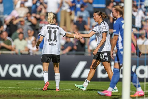 GER, Karlsruhe, Karlsruher SC vs. Eintracht Frankfurt, SC, DFB Women s Cup, Soccer, DFB, 2026–2027 season, Badenia Stadium, Round 1: Pictured from left, Nina Lührsen (Eintracht Frankfurt Women, No. 11) congratulates Larissa Mühlhaus (Eintracht Frankfurt Women, No. 47) on her goal, goal, celebration and joy, emotions. DFB and DFL regulations prohibit any use of photographs as image sequences and or quasi-video. September 27, 2026 Copyright: HMBxMedia HendrikxHamelau