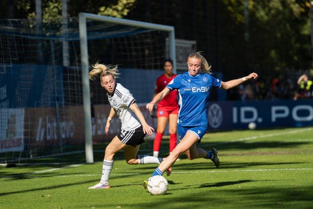 September 27, 2026, xjyhynx, Women s DFB Cup First Round, Karlsruher SC vs. Eintracht Frankfurt; from left: Nina Lührßen (11), Eintracht Frankfurt, and Mia Rodach (17), Karlsruher SC, playing a pass in Karlsruhe