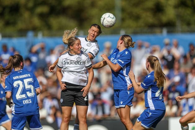 GER, Karlsruhe, Karlsruher SC vs. Eintracht Frankfurt SC, DFB Women s Cup, Soccer, DFB, 2026–2027 Season, Badenia Stadium, 1st Round (pictured, from left): Emily Evels (Karlsruher SC Women s 25), Danique Tolhoek, Eintracht Frankfurt Women’s Team 22, Larissa Mühlhaus, Eintracht Frankfurt Women’s Team 47. DFB and DFL regulations prohibit any use of photographs as image sequences and or quasi-video. September 27, 2026 Copyright: HMBxMedia HendrikxHamelau
