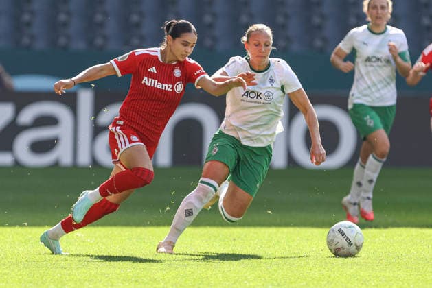 Kassandra Potsi of FC Bayern Munich and Yvonne Zielinski of Borussia Mönchengladbach in a tackle during the DFB Women’s Cup match between Borussia Mönchengladbach and FC Bayern Munich at Borussia Park on September 27, 2026, in Mönchengladbach, Germany. Photo by Oliver Kaelke, DeFodi Images. Kassandra Potsi of FC Bayern Munich and Yvonne Zielinski of Borussia Mönchengladbach battle for the ball during the DFB Women’s Cup match between Borussia Mönchengladbach and FC Bayern Munich at ista Borussia Park on September 27, 2026 in Mönchengladbach, Germany. Photo by Oliver Kaelke, DeFodi Images. DFB and DFL regulations prohibit any use of photographs as image sequences and or quasi-video. Photo by Oliver Kaelke, DeFodi Images.