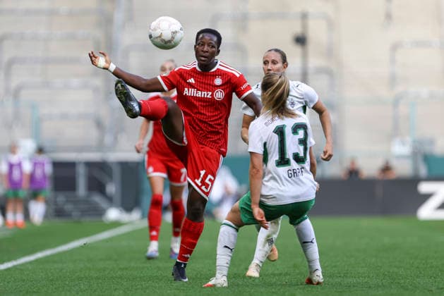 Bernadette Kakounan Amani of FC Bayern Munich and Luca Graf of Borussia Mönchengladbach in a tackle during the Women s DFB Cup match between Borussia Mönchengladbach and FC Bayern Munich, at Borussia Park on September 27, 2026, in Mönchengladbach, Germany. Photo by Oliver Kaelke, DeFodi Images. Bernadette Kakounan Amani of FC Bayern Munich and Luca Graf of Borussia Mönchengladbach battle for the ball during the DFB Women’s Cup match between Borussia Mönchengladbach and FC Bayern Munich at ista Borussia Park on September 27, 2026 in Mönchengladbach, Germany. Photo by Oliver Kaelke, DeFodi Images. DFB and DFL regulations prohibit any use of photographs as image sequences and or quasi-video. Photo by Oliver Kaelke, DeFodi Images.