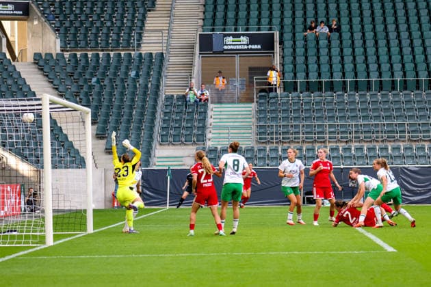 Mönchengladbach, Germany, September 27, 2026, DFB Women s Cup: Borussia Mönchengladbach Women vs. FC Bayern Women. Pictured: Goal scorer Vanessa Gilles (FCB) lies on the field after scoring the equalizer to make it 1-1 for FC Bayern. Copyright: HMBxMedia MadeleinexFantini