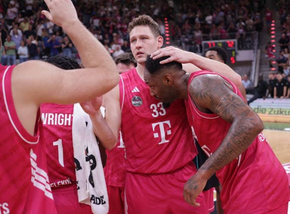 Patrick Heckmann of Bonn and Jeff Garrett of Bonn celebrate at the final buzzer, Bonn, Germany, September 27, 2026, Basketball Bundesliga, Matchday 3, Telekom Baskets Bonn vs. Syntainics MBC