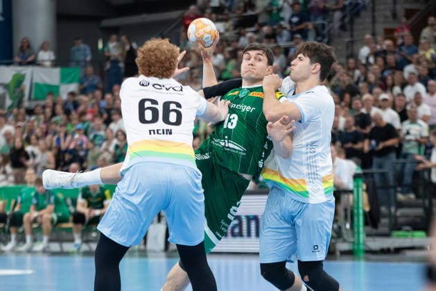 Handball, HBL2: SC DHfK Leipzig vs. TSV Bayer Dormagen, September 27, 2026; Matej Klima 13; SC DHfK Leipzig caught between Julius Hein 66 (Bayer Dormagen) and Luca Krist 2 (Bayer Dormagen); Handball, 2nd Bundesliga, 2026–2027 season, Matchday 5: SC DHfK Leipzig vs. TSV Bayer Dormagen on September 27, 2026, at the Quarterback Immobilien Arena Leipzig Copyright: xBEAUTIFULxSPORTS JanxKaeferx