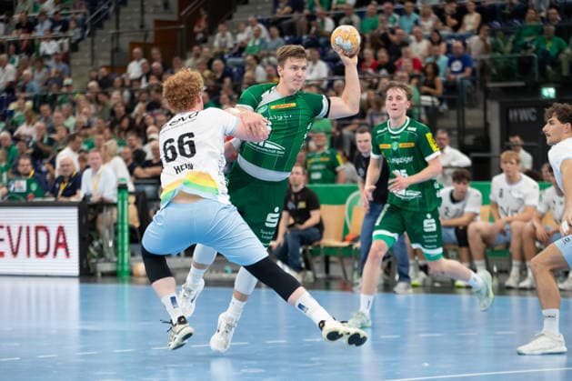 Handball, HBL2: SC DHfK Leipzig vs. TSV Bayer Dormagen, September 27, 2026. Julius Hein (66) as Bayer Dormagen pulls on Fritz Leon Haake (6), SC DHfK Leipzig. Handball, 2nd Bundesliga, 2026–2027 season, Matchday 5: SC DHfK Leipzig vs. TSV Bayer Dormagen on September 27, 2026, at the Quarterback Immobilien Arena Leipzig Copyright: xBEAUTIFULxSPORTS JanxKaeferx