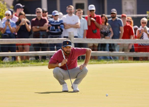 Cameron Young of the United States lines up a putt on the second hole during a singles match on the final day of the 2026 President s Cup golf tournament at Medinah Country Club in Chicago, Illinois, on Sunday, September 27, 2026.  CHI20260927715 TANNENxMAURY