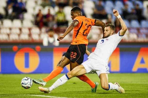BELGRADE - Denzel Dumfries of the Netherlands, Strahinja PavloviÄ‡ of Serbia (lr) during the UEFA Nations League match between Serbia and Germany at the Rajko MitiÄ‡ Stadium on 27 September 2026 in Belgrade. ANP KOEN VAN WEEL xVIxANPxSportx xxANPxIVx 570422466 originalFilename: 570422466.jpg