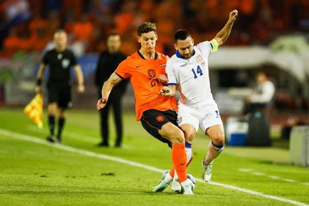 BELGRADE - Ruben van Bommel of the Netherlands, Andrija Å½ivkoviÄ‡ of Serbia (lr) during the UEFA Nations League match between Serbia and Germany at the Rajko MitiÄ‡ Stadium on 27 September 2026 in Belgrade. ANP KOEN VAN WEEL xVIxANPxSportx xxANPxIVx 570423285 originalFilename: 570423285.jpg