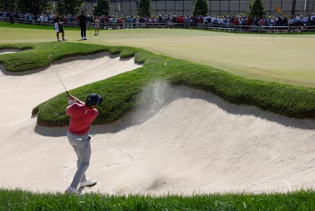 Cameron Young of the United States hits out of a bunker to the third green during a singles match on the final day of the 2026 President s Cup golf tournament at Medinah Country Club in Chicago, Illinois, on Sunday, September 27, 2026.  CHI20260927719 TANNENxMAURY